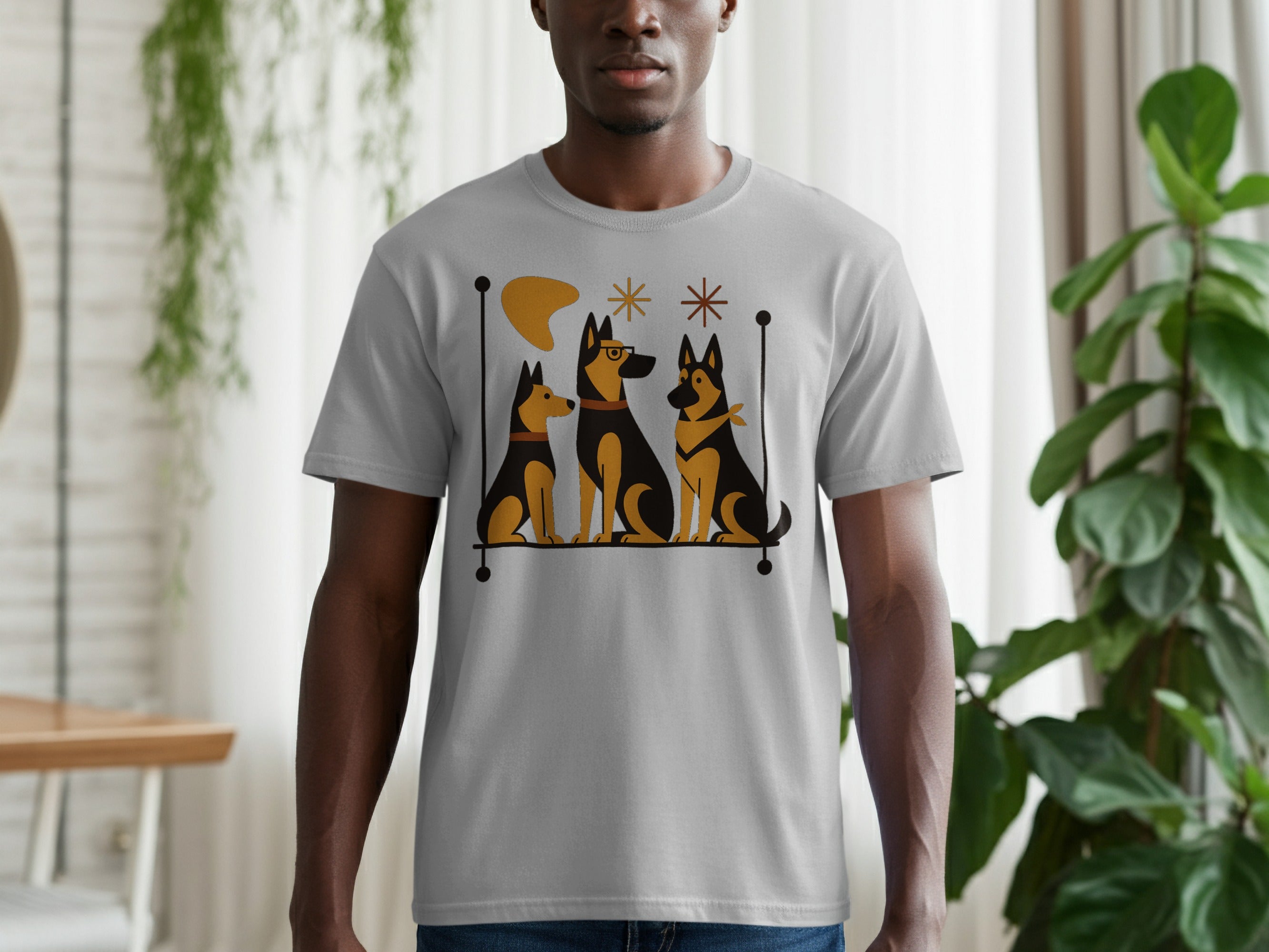 Grey t-shirt with a graphic of three stylized dogs sitting in a line.