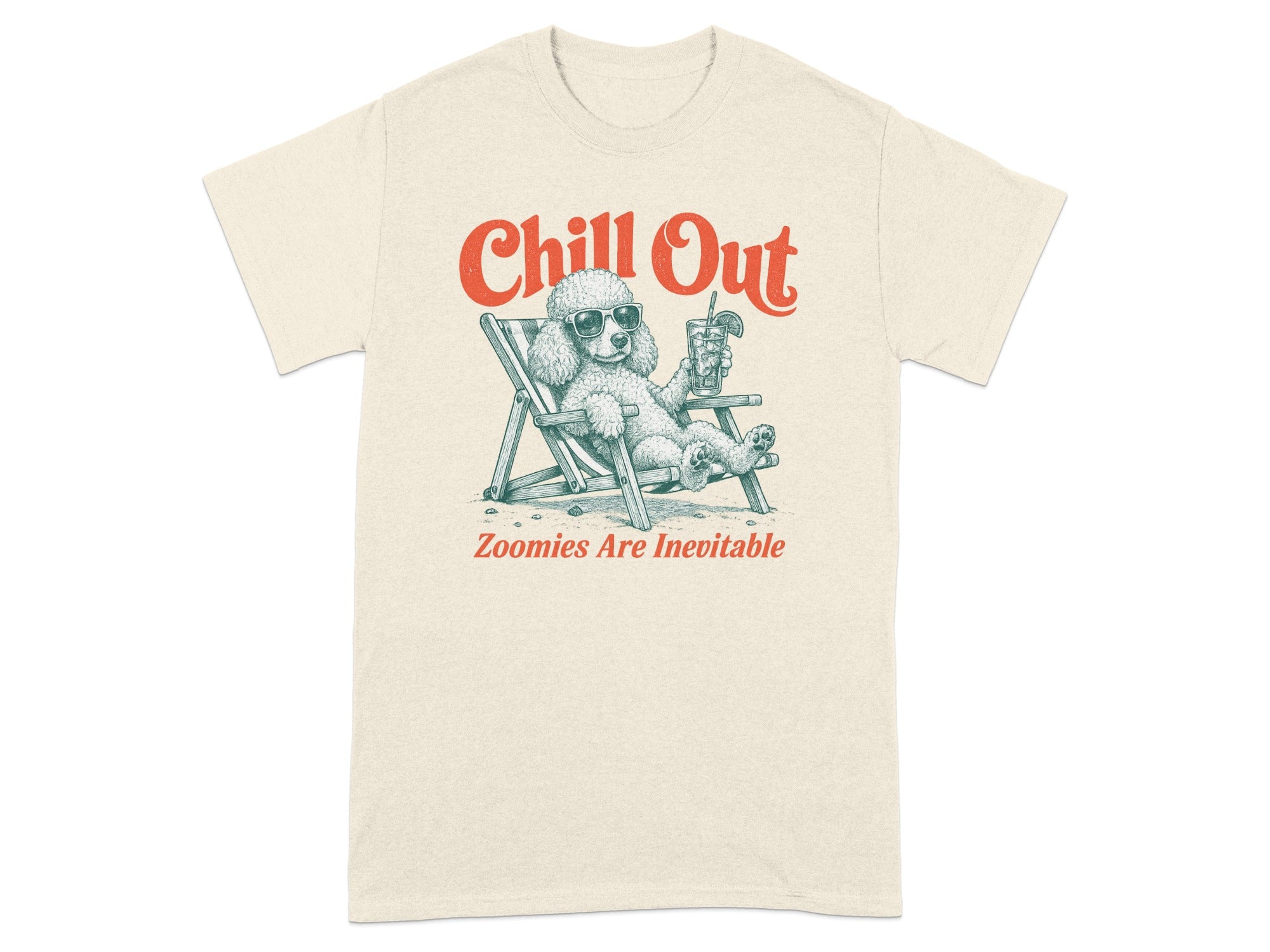 Cream t-shirt with dog in lounge chair, sunglasses, and drink. "Chill Out" and "Zoomies Are Inevitable".