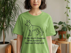 Green t-shirt with line drawing of a German Shepherd and text "I'd Be Much Happier With Another German Shepherd".