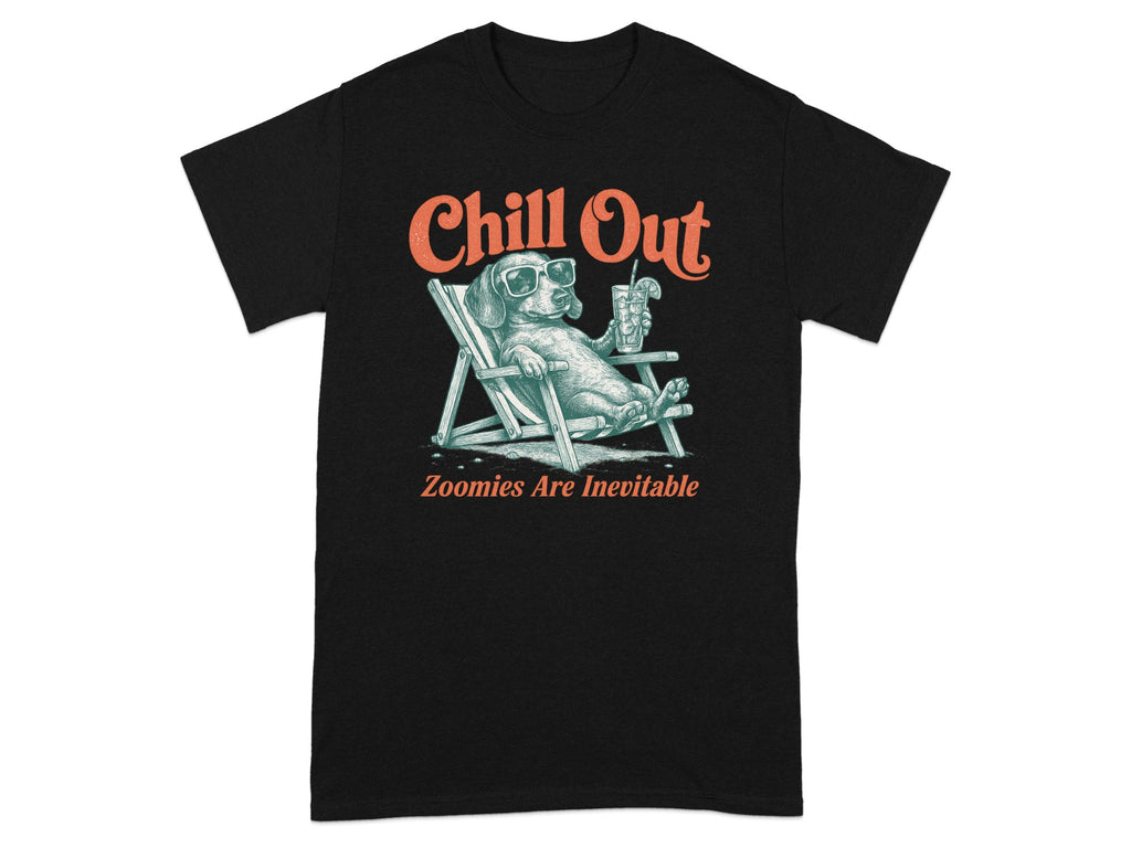 Black t-shirt with a dog in a lounge chair, wearing sunglasses, holding a drink. Text reads "Chill Out Zoomies Are Inevitable".