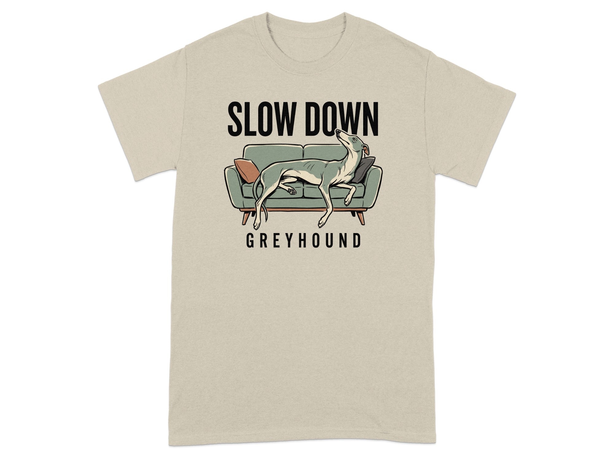 Beige t-shirt with a greyhound relaxing on a couch, text reads "SLOW DOWN GREYHOUND".