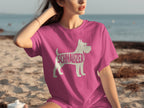 Pink t-shirt with white silhouette of a schnauzer dog and text on the front.