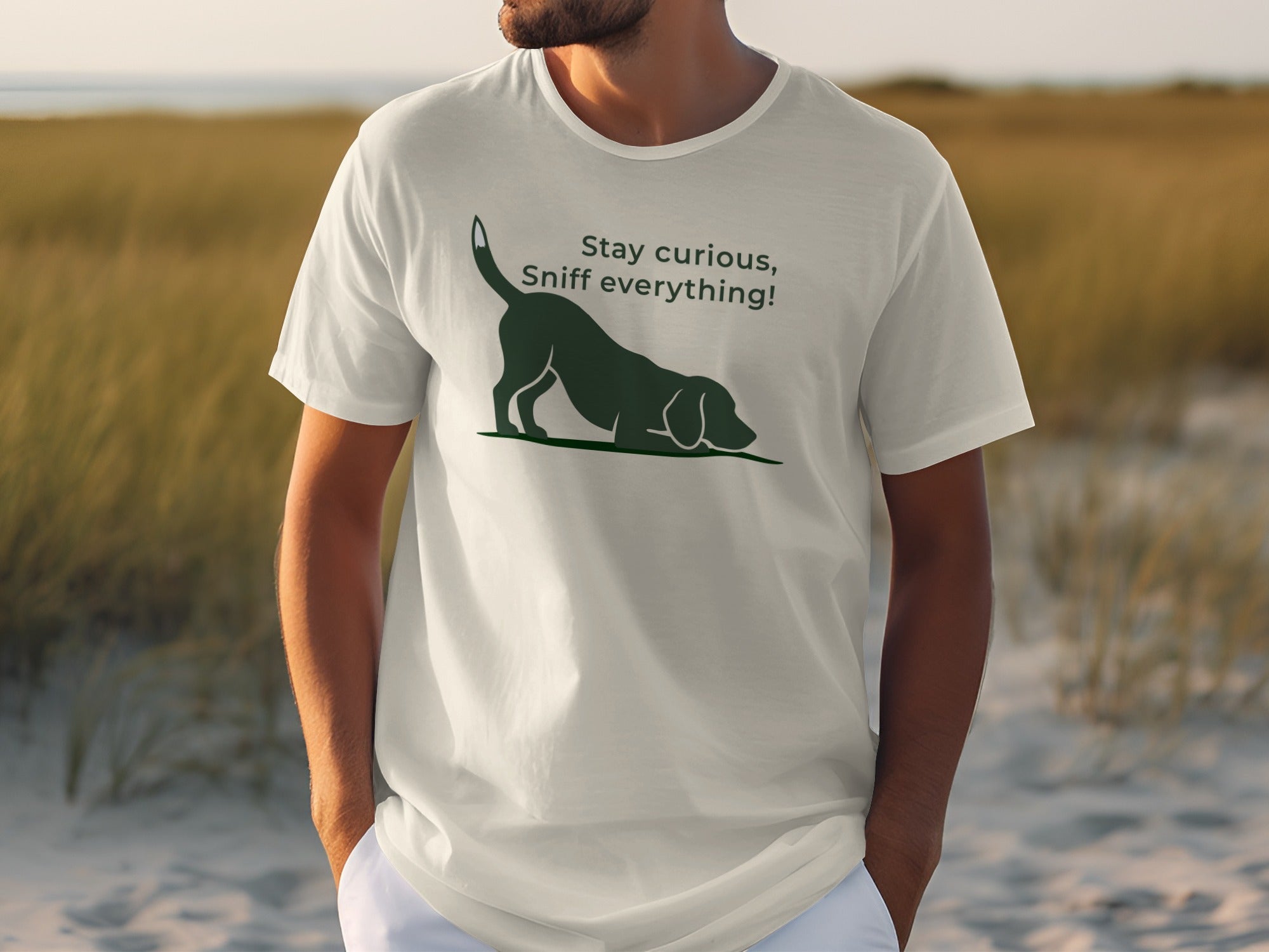 White t-shirt with a black dog and "Stay curious, sniff everything!" text.