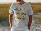 T-shirt with seven cartoon poodles and a cat playing with yarn.