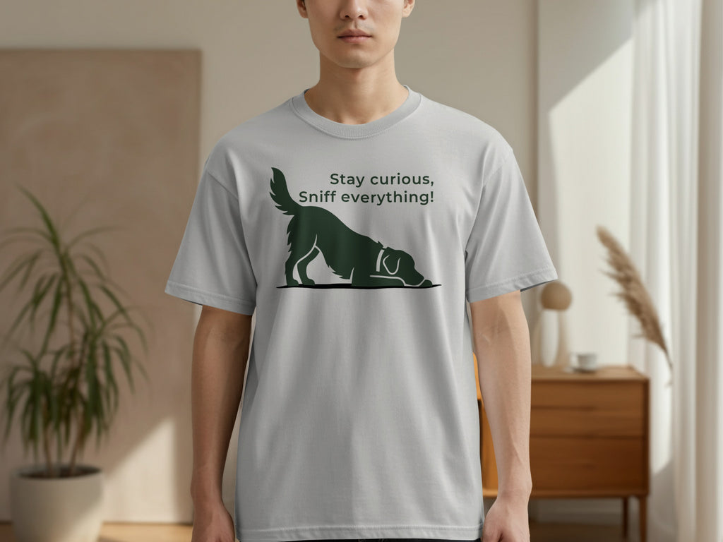 Light gray t-shirt with a black silhouette of a dog and the text "Stay curious, sniff everything!".