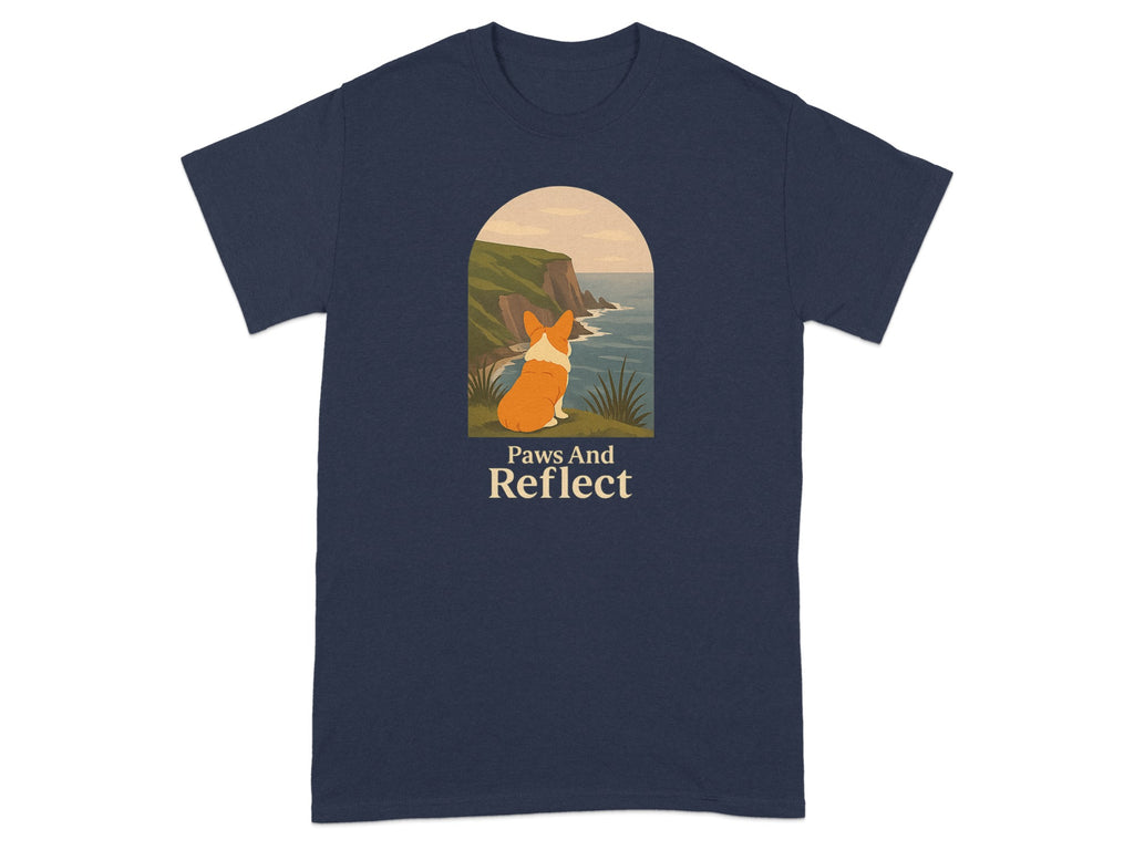 T-shirt with a corgi looking at the ocean with text "Paws And Reflect."