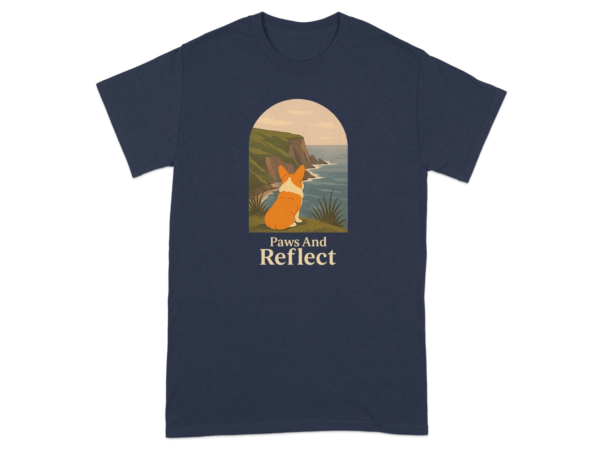 T-shirt with a corgi looking at the ocean with text "Paws And Reflect."