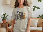 T-shirt with illustration of four dogs of different breeds.