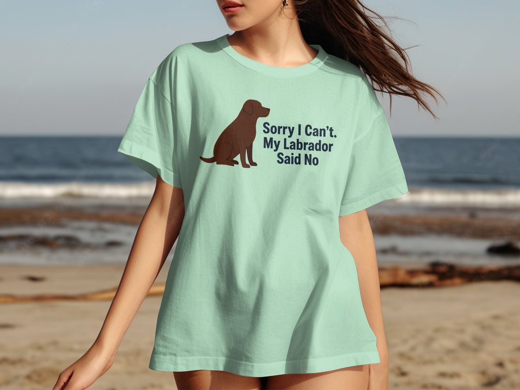 Light green t-shirt with brown Labrador silhouette and text "Sorry I Can't. My Labrador Said No".