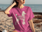 Pink t-shirt with white poodle graphic and "POODLE" text.