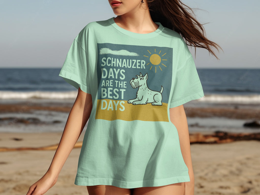 Light teal t-shirt with "Schnauzer Days Are The Best Days" text and a cartoon schnauzer.