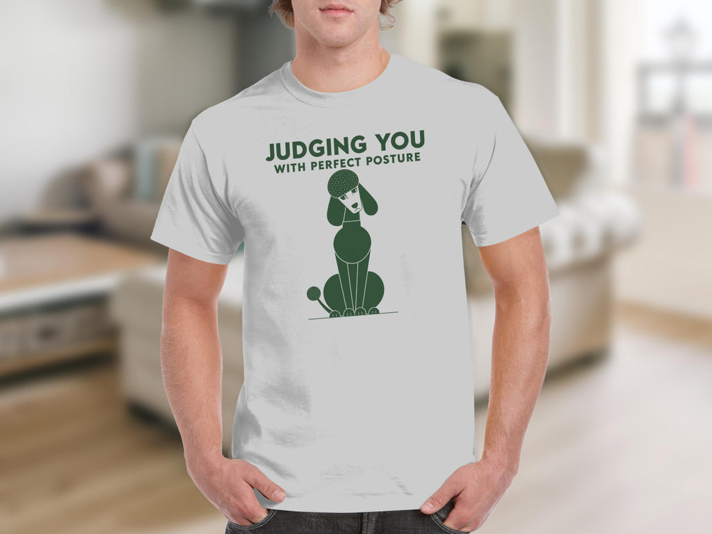 Light gray t-shirt with a green poodle graphic and text "JUDGING YOU WITH PERFECT POSTURE".