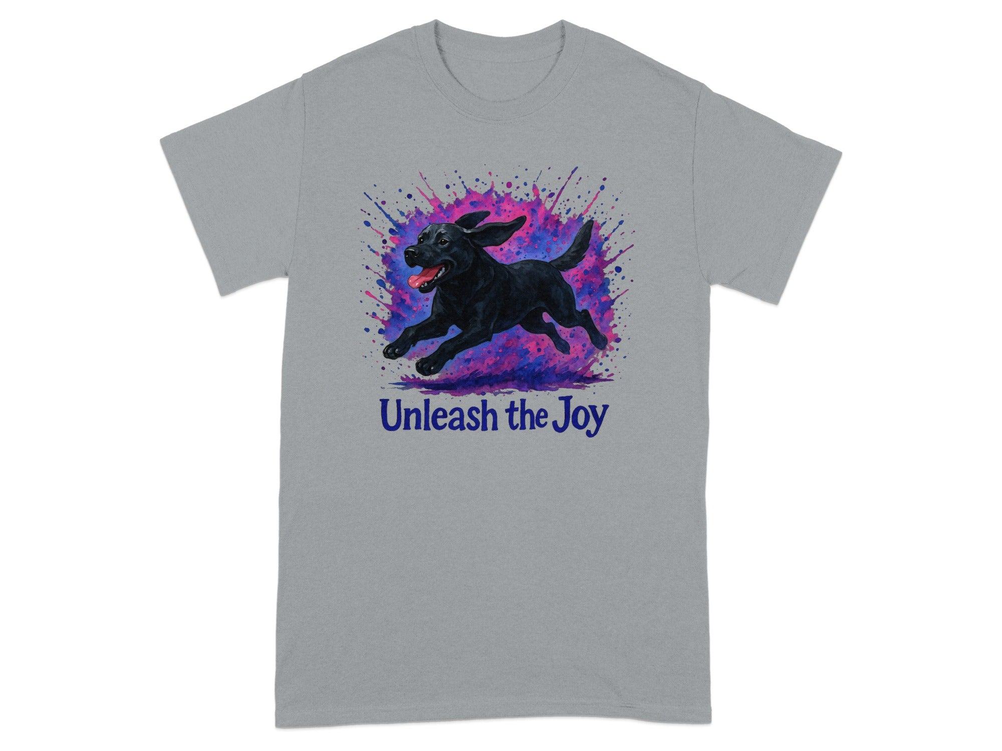Grey t-shirt with a black dog mid-leap surrounded by colorful paint splatters and the text "Unleash the Joy".