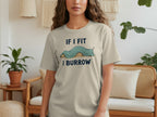 Light tan t-shirt with "IF I FIT I BURROW" text and a cartoon dachshund.