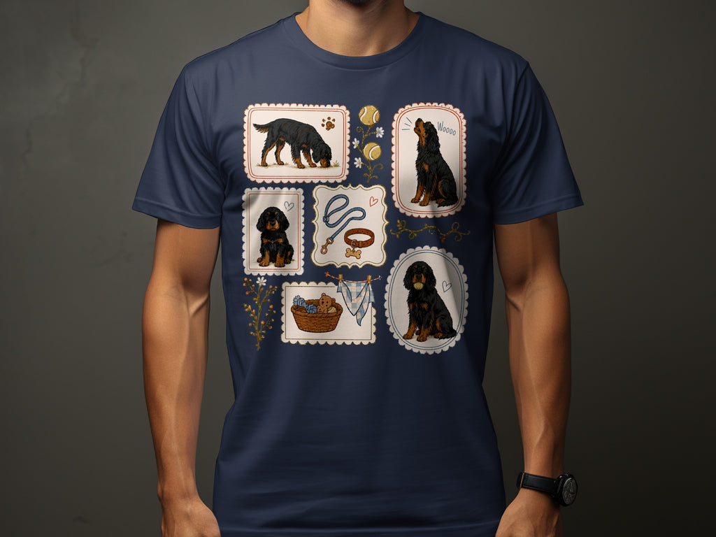 Illustration of dogs and related items in framed vignettes on a navy t-shirt.