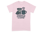 Pink t-shirt with illustration of schnauzer and coffee cup, text "POWERED BY SCHNAUZER & COFFEE".
