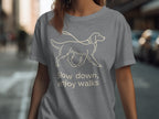 Grey t-shirt with line drawing of a walking dog and text "Slow down, enjoy walks".