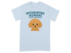 Light blue t-shirt with cartoon poodle and "Outsmarting Humans Since Puppyhood" text.