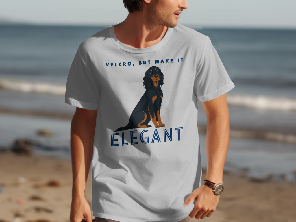 Man wearing t-shirt with a dog and "Velcro, but make it elegant" text.