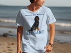 Light blue t-shirt with a black and tan dog and "VELCRO, BUT MAKE IT ELEGANT" text.