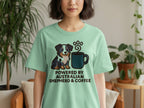 Light green t-shirt with Australian Shepherd and coffee mug graphic and text.