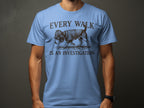 Light blue t-shirt with "EVERY WALK IS AN INVESTIGATION" and detective dog graphic.