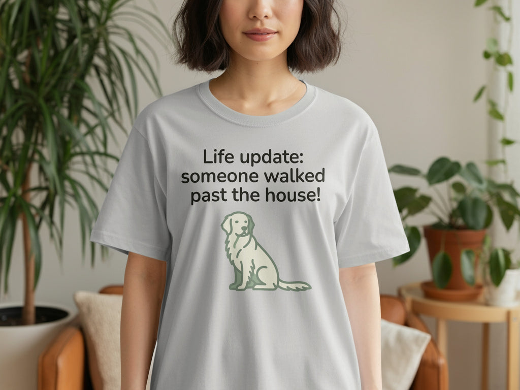 Gray t-shirt with text "Life update: someone walked past the house!" and a dog graphic.