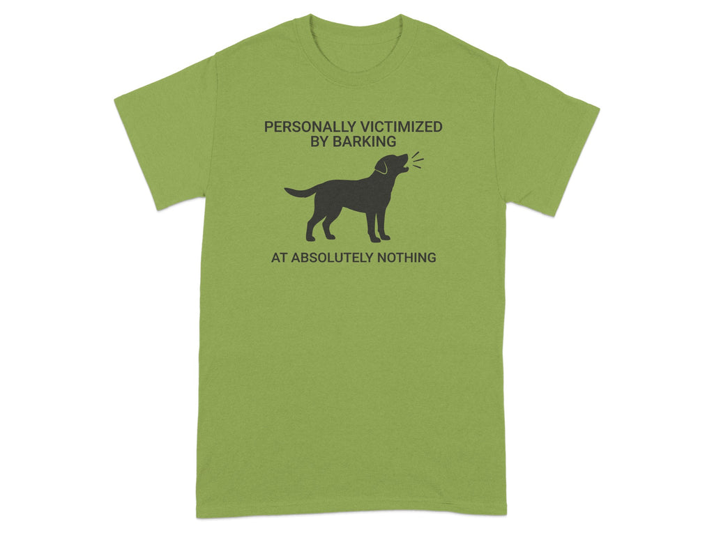 Green t-shirt with dog silhouette and text "PERSONALLY VICTIMIZED BY BARKING AT ABSOLUTELY NOTHING".