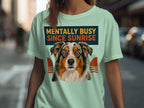Light blue t-shirt with "MENTALLY BUSY SINCE SUNRISE" and dog graphic.