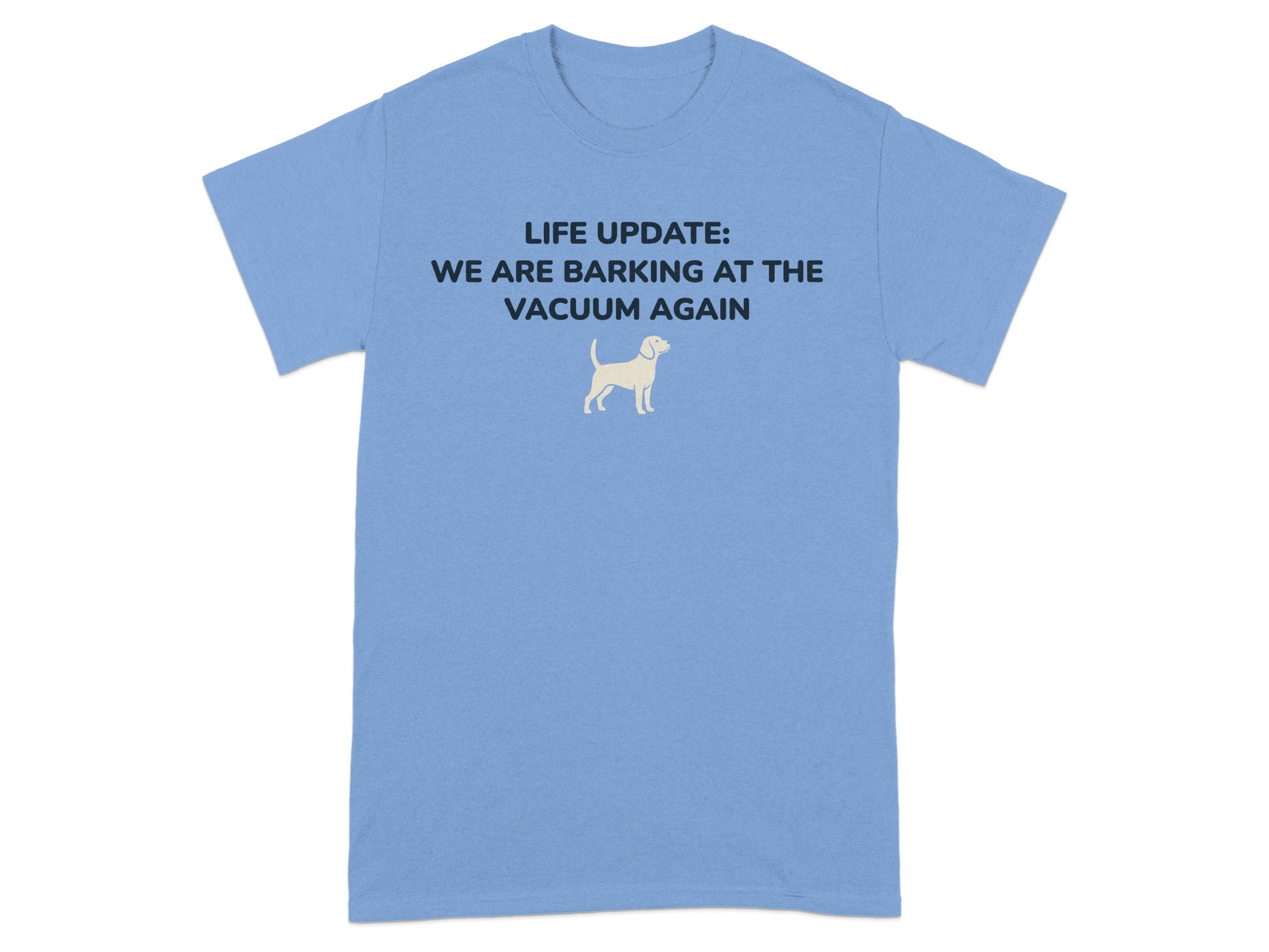 Blue t-shirt with white text: "LIFE UPDATE: WE ARE BARKING AT THE VACUUM AGAIN" and a dog silhouette.