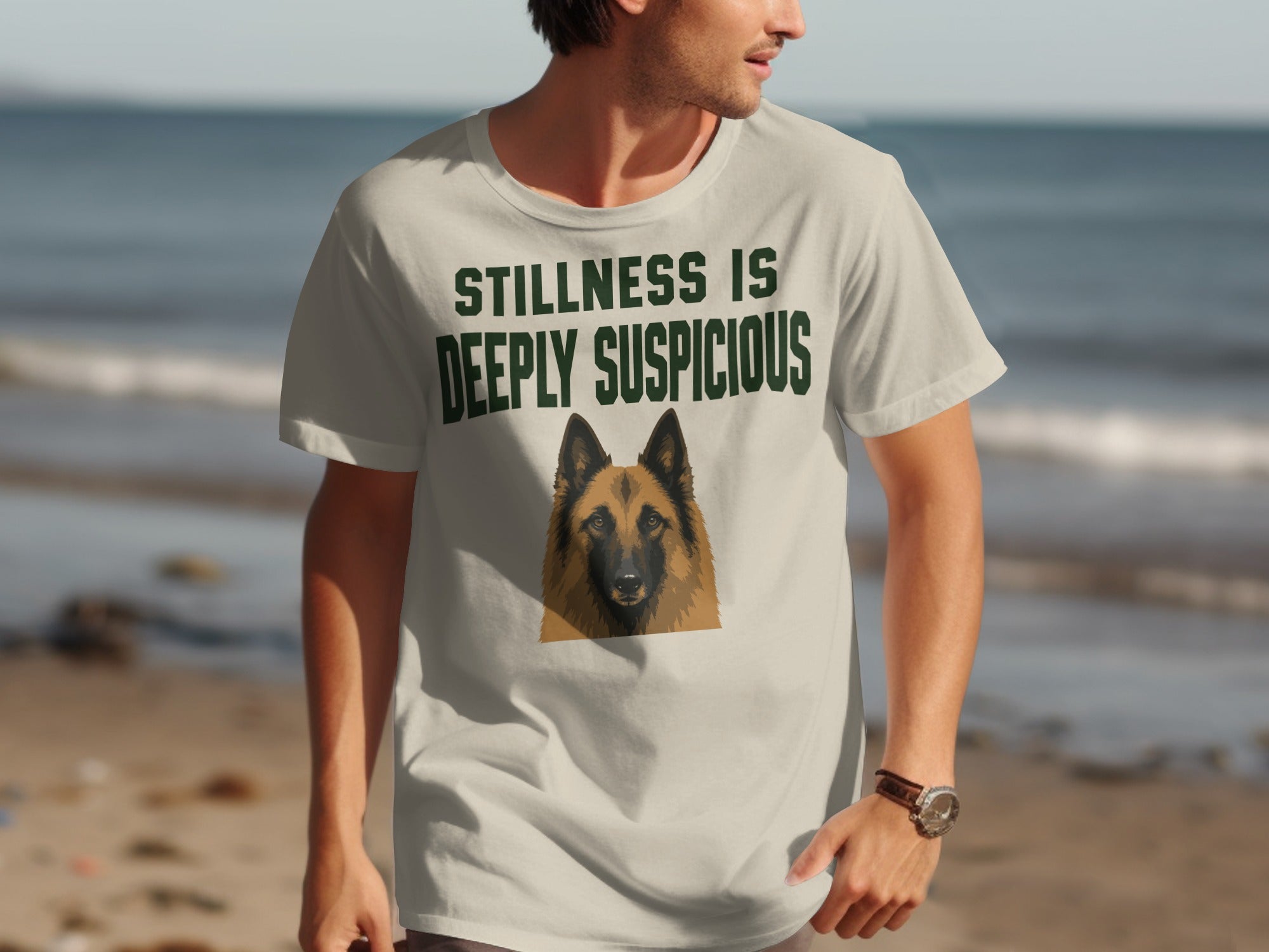 T-shirt with a dog's face and "STILLNESS IS DEEPLY SUSPICIOUS" text.