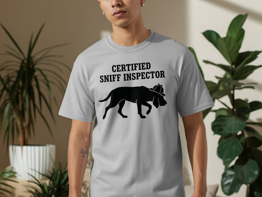 Grey t-shirt with a dog wearing a hat and "CERTIFIED SNIFF INSPECTOR" text.