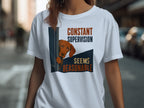 T-shirt with brown dog peeking from behind a blue sign that reads "constant supervision seems reasonable."