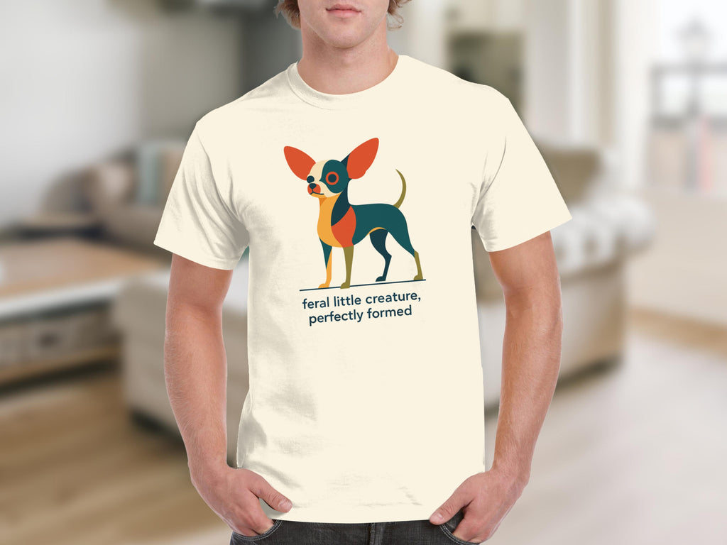 Cream t-shirt with geometric chihuahua graphic and text "feral little creature, perfectly formed".