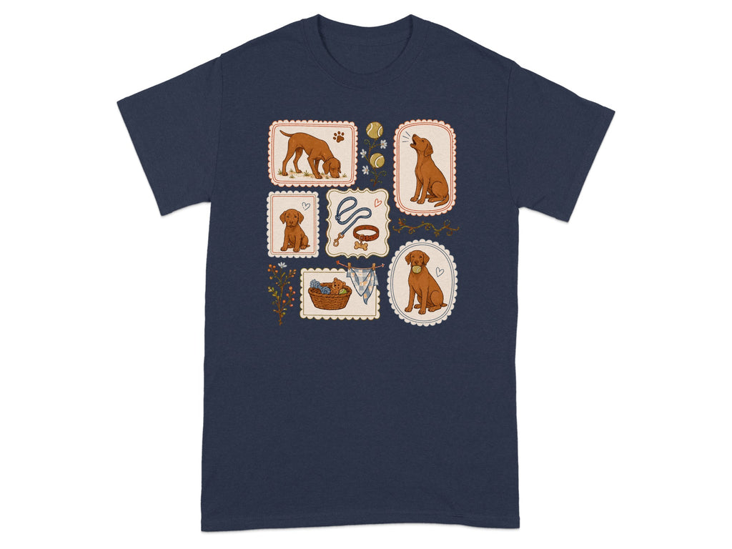 Navy t-shirt with framed illustrations of a brown dog, a tennis ball, and a basket of yarn.