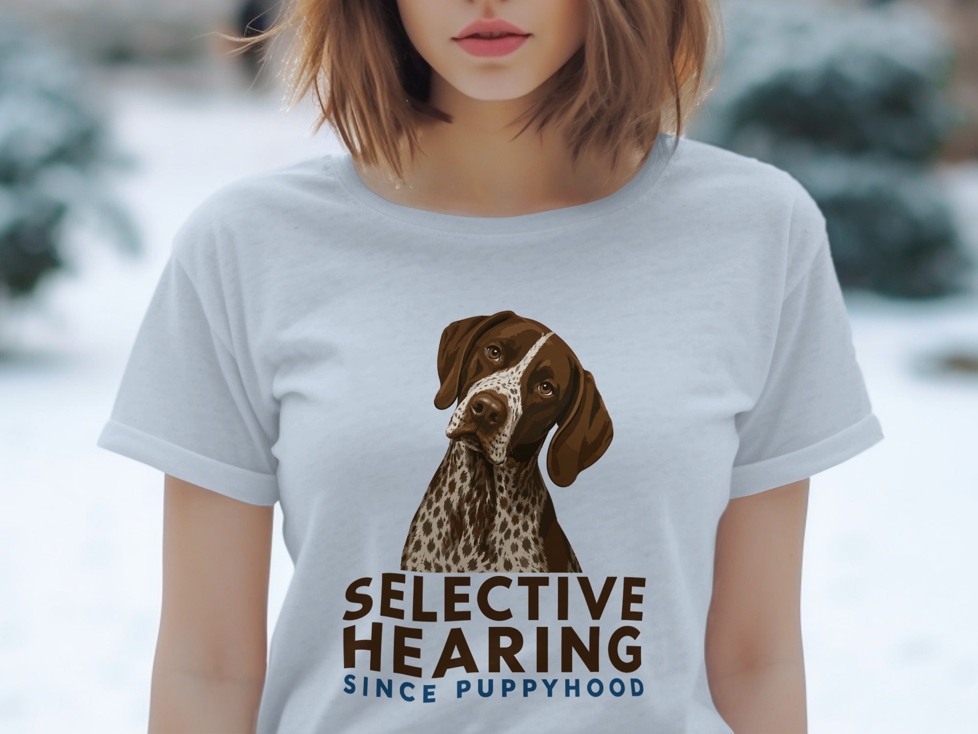 Dog wearing t-shirt with "SELECTIVE HEARING SINCE PUPPYHOOD" text.