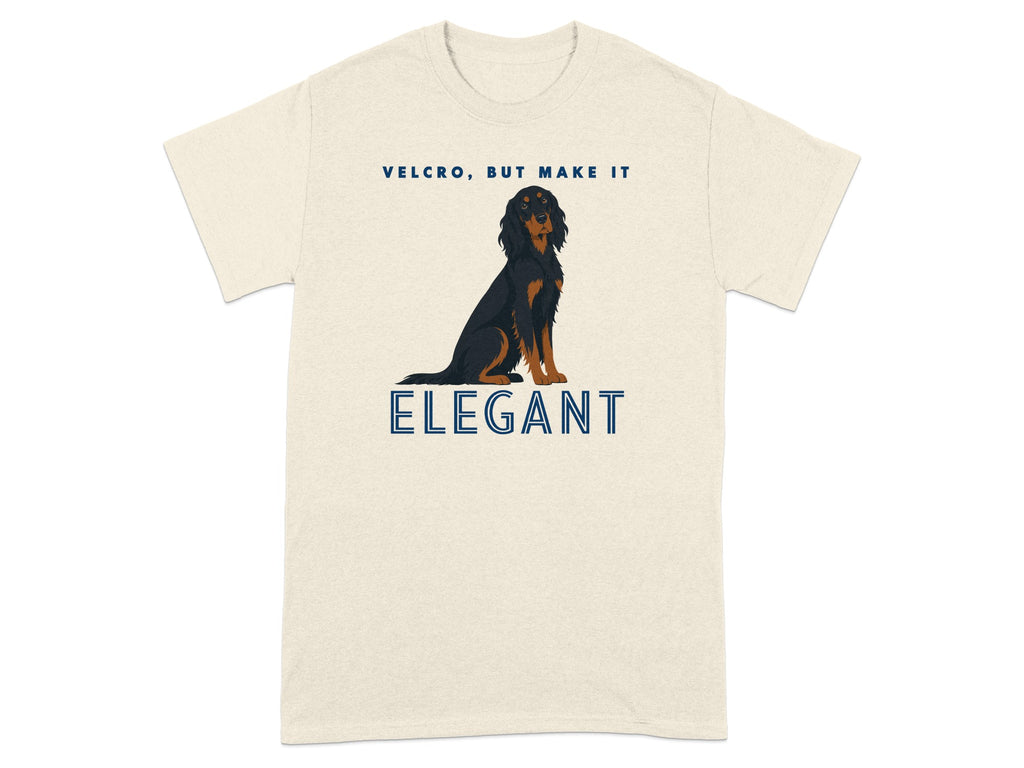 Cream t-shirt with dog graphic and text "VELCRO, BUT MAKE IT ELEGANT".