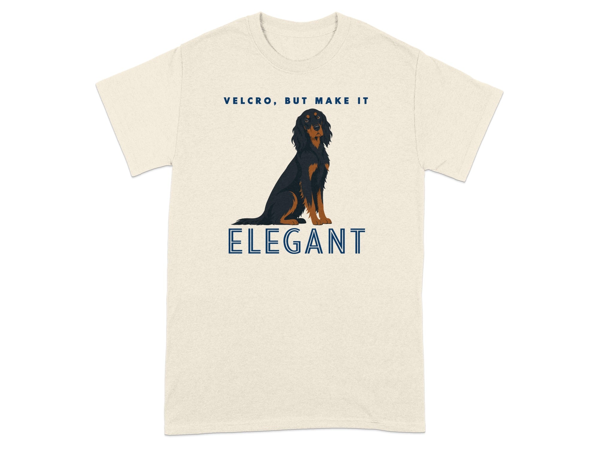 Cream t-shirt with dog graphic and text "VELCRO, BUT MAKE IT ELEGANT".