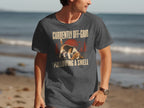 Man wearing charcoal t-shirt with text "Currently Off-Grid Following a Smell" and beagle.