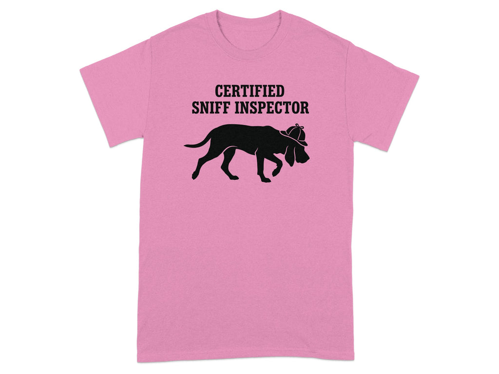 Pink t-shirt with black silhouette of a dog wearing a detective hat and text.