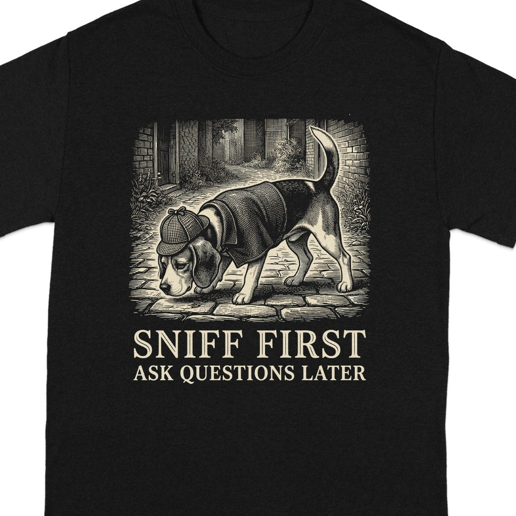 Black t-shirt with graphic of a dog wearing a detective hat, text reads "SNIFF FIRST ASK QUESTIONS LATER".