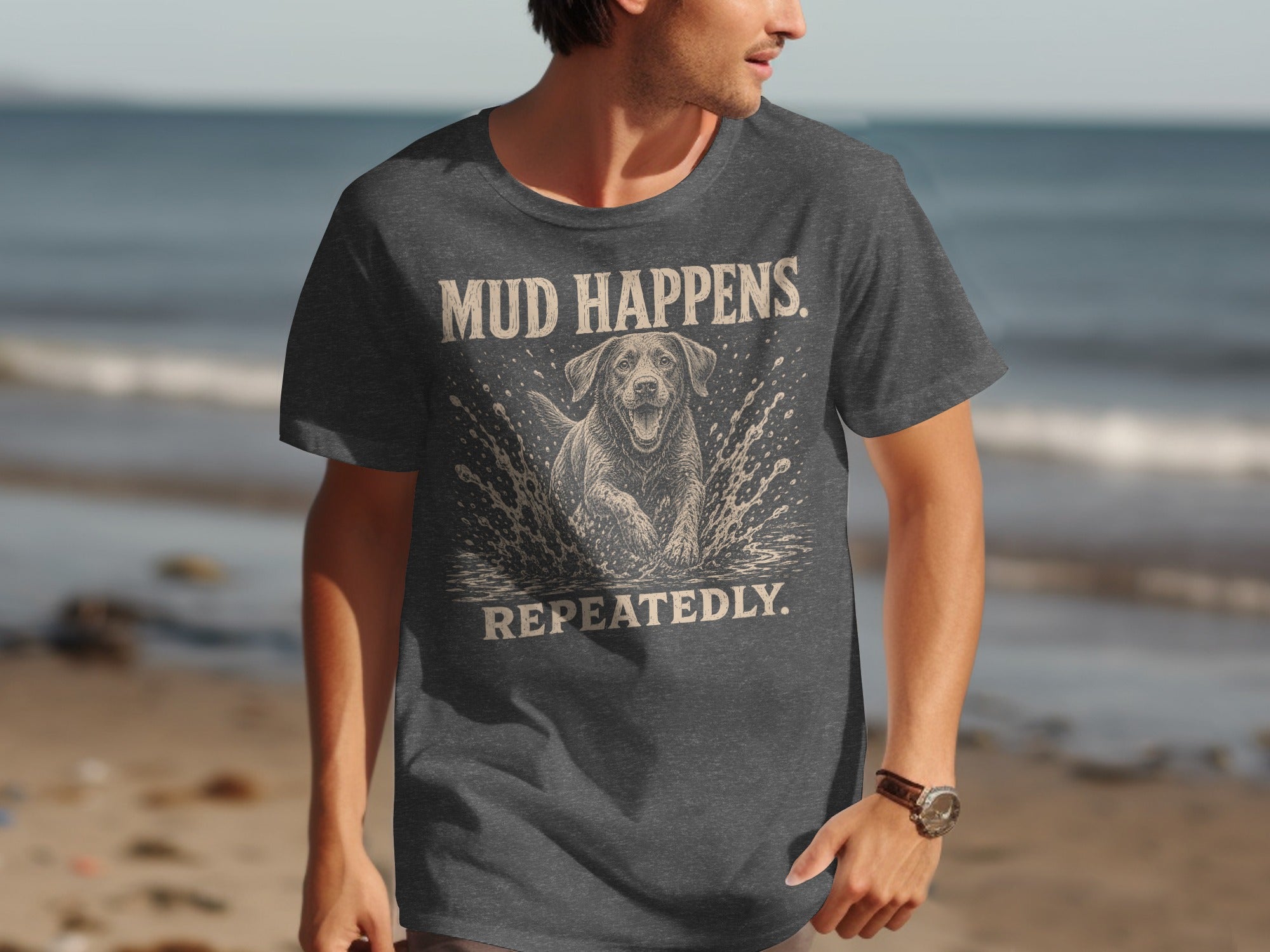 Charcoal t-shirt with a Labrador splashing in water and text "Mud Happens Repeatedly."