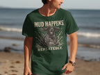 Dark green t-shirt with "MUD HAPPENS REPEATEDLY" text and dog splashing in water graphic.