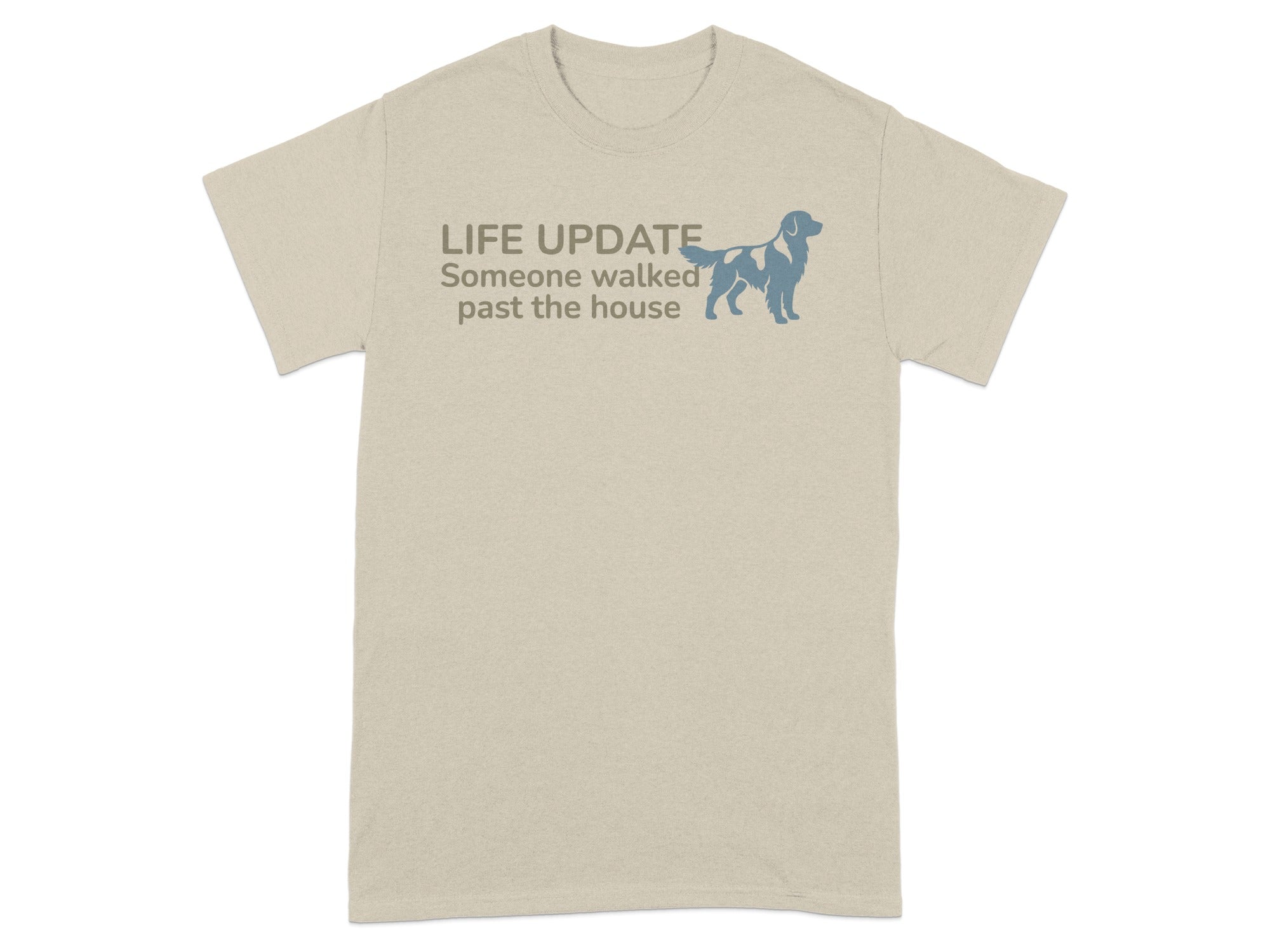Tan t-shirt with text "LIFE UPDATE Someone walked past the house" and dog silhouette.