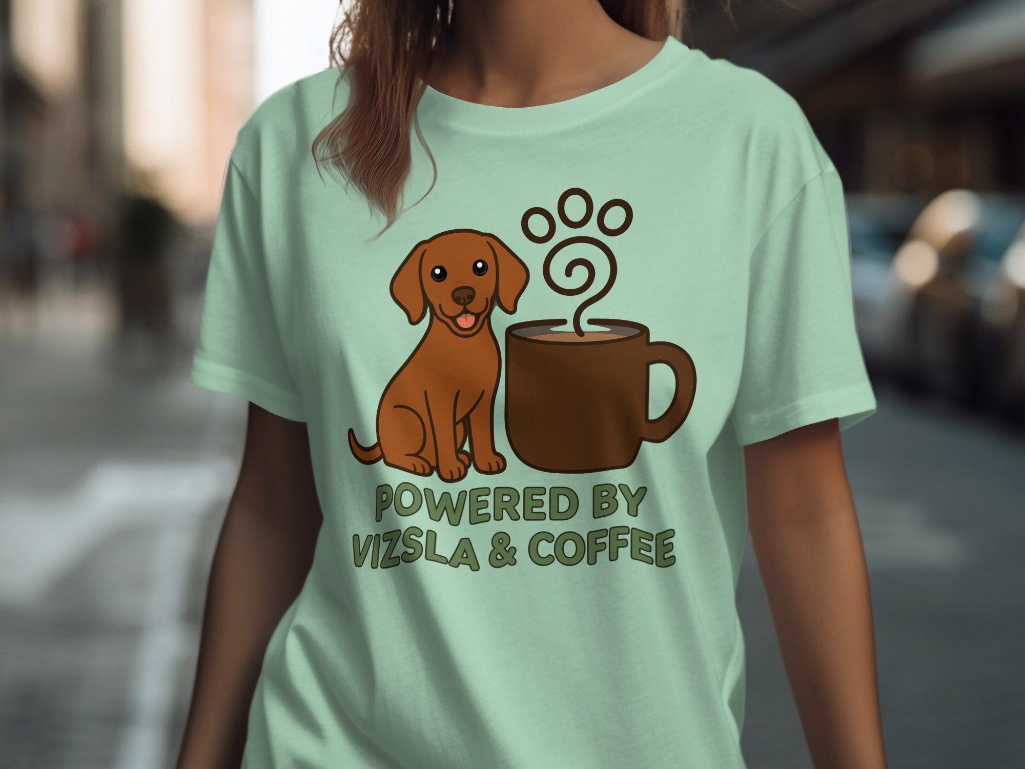 Dog sitting next to a coffee mug with text "POWERED BY VIZSLA & COFFEE".