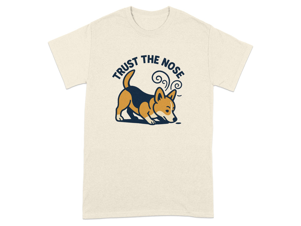 Cream t-shirt with a corgi sniffing and text "TRUST THE NOSE".