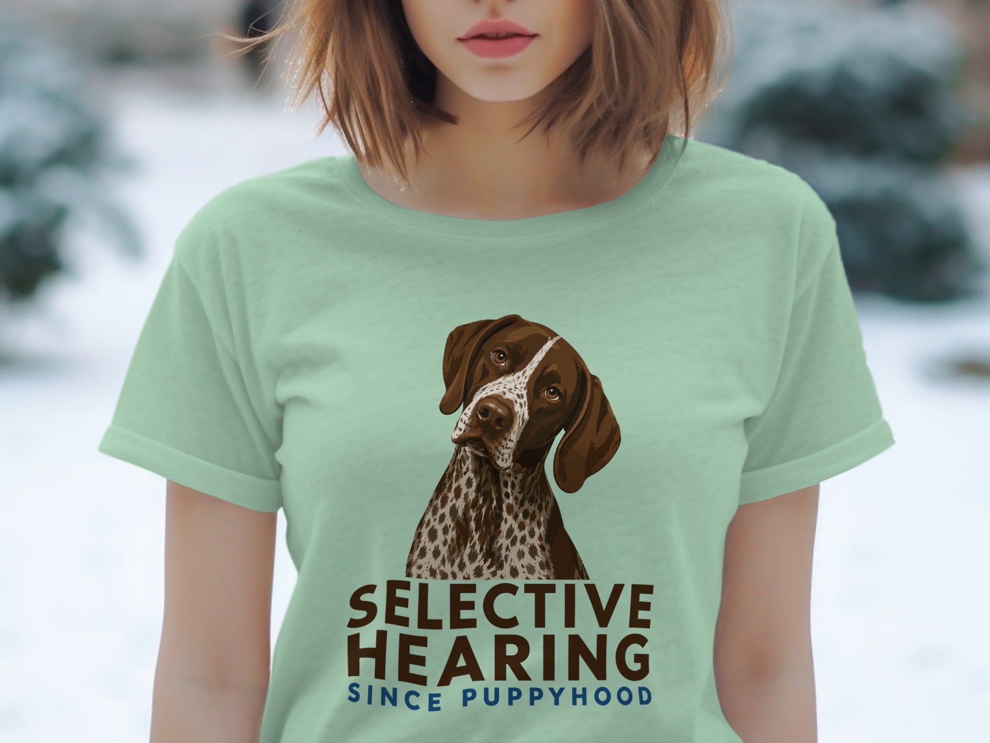 Mint green t-shirt featuring a German Shorthaired Pointer illustration and "Selective Hearing Since Puppyhood" text.
