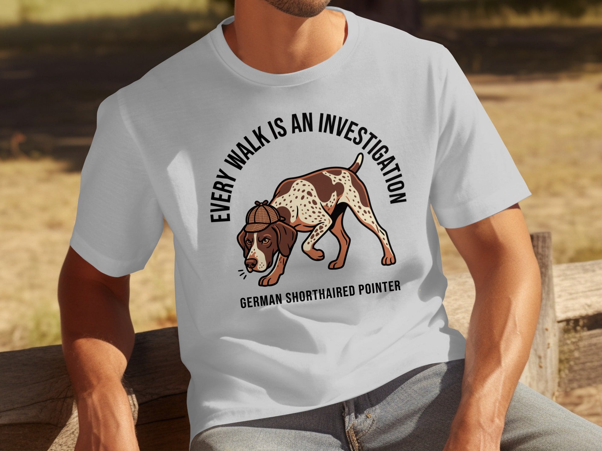German Shorthaired Pointer wearing a detective hat on a t-shirt.