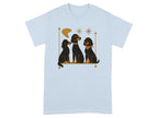 Three distinct black dogs sitting in a row, two with and one without glasses.
