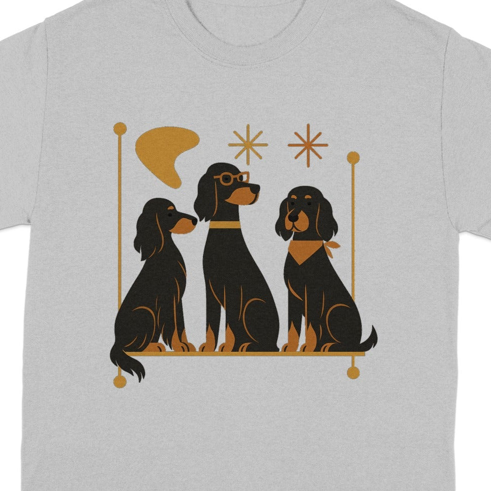 Three black dogs sit and look forward, one wearing glasses.